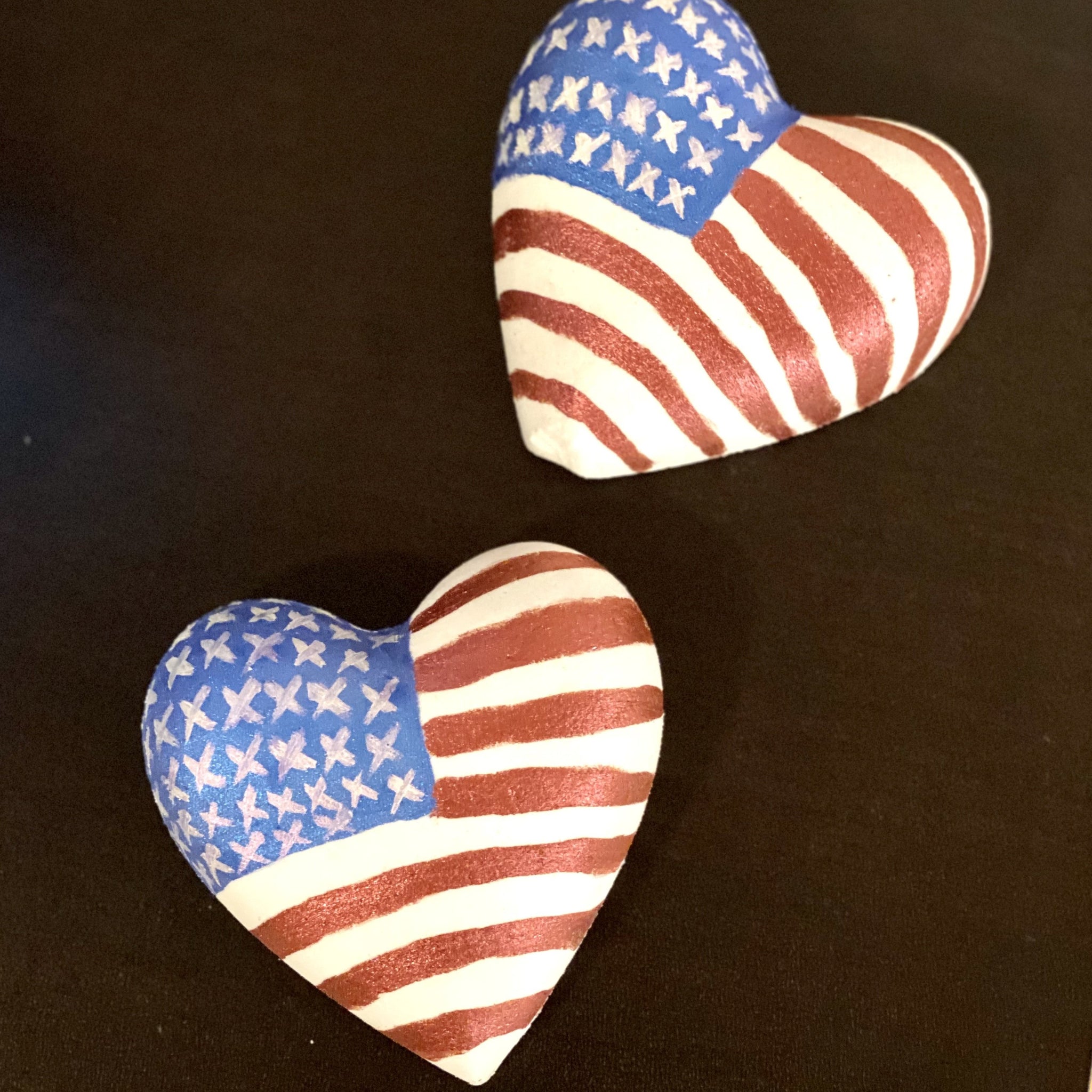 Big beautiful heart bath bomb with the American flag painted on it. 