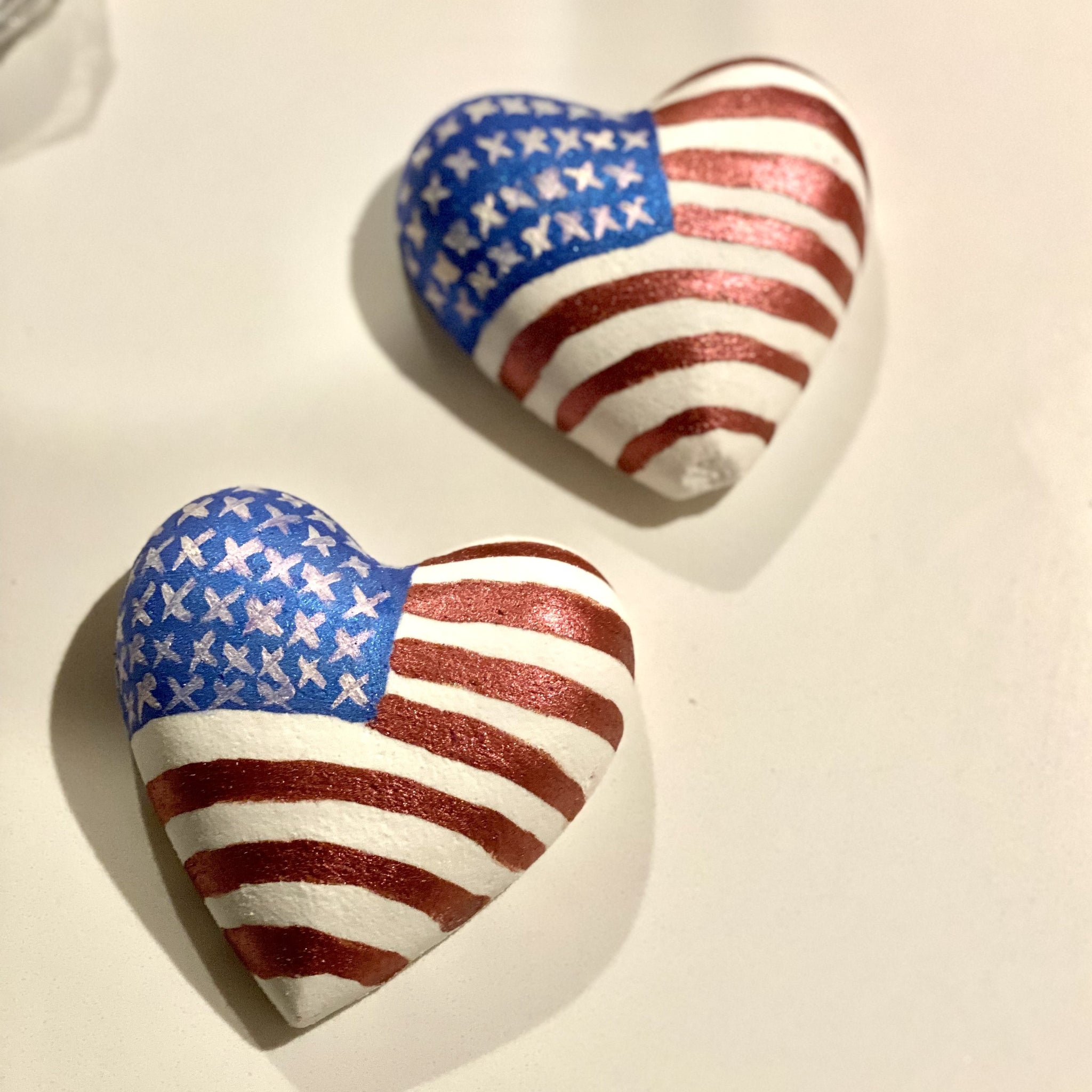 Big beautiful heart bath bomb with the American flag painted on it. 