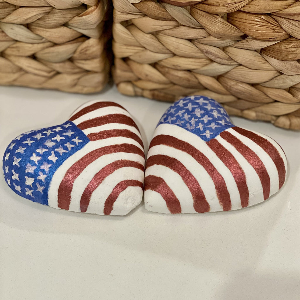 Big beautiful heart bath bomb with the American flag painted on it. 