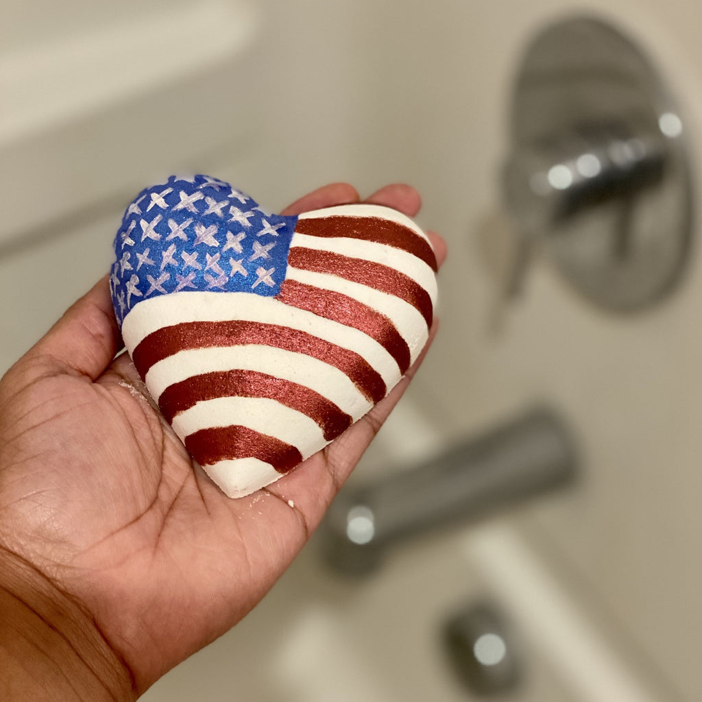 Big beautiful heart bath bomb with the American flag painted on it. 